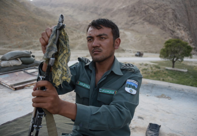 afghan police oils gun