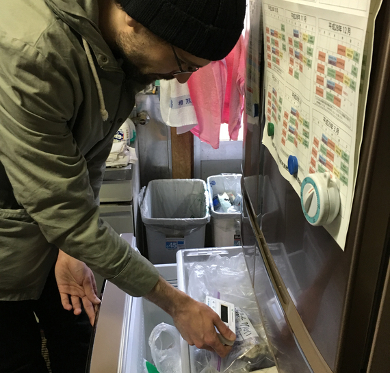 Crew member and animator Christian Schlaeffer puts his Geiger counter to the frozen boar feet.