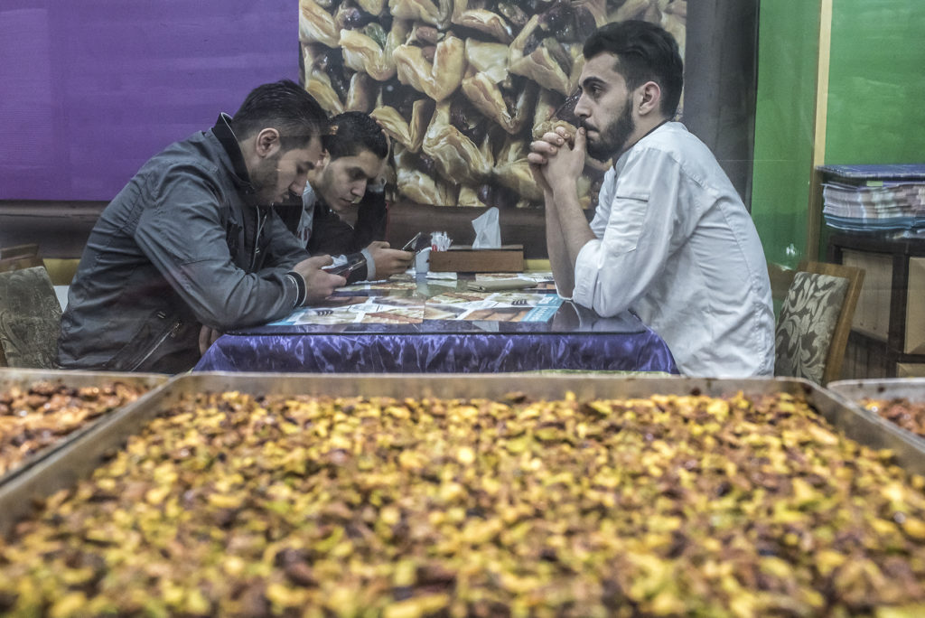 Customers eat at Salloura in Istanbul. (Photo by Joris van Gennip/GroundTruth)