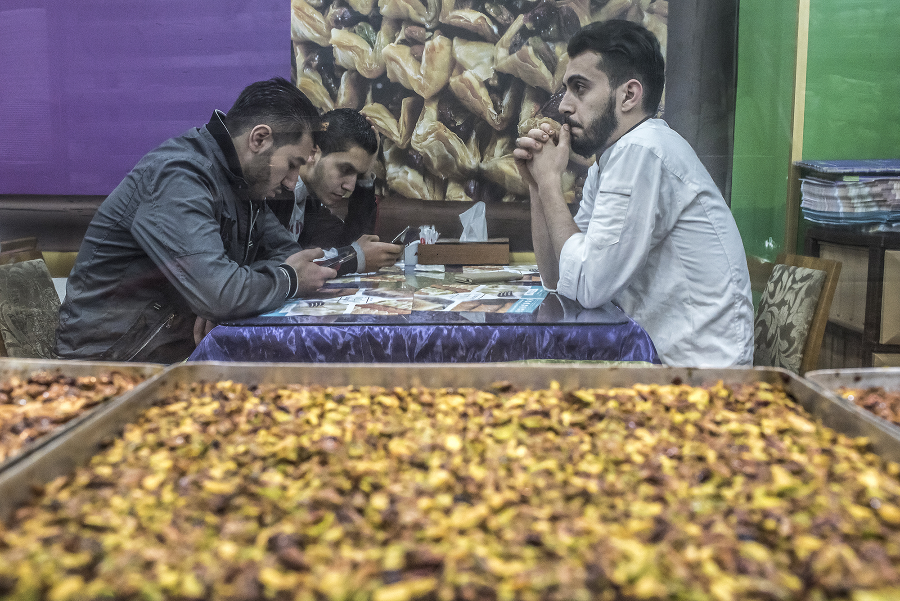 Customers eat at Salloura in Istanbul. (Photo by Joris van Gennip/GroundTruth)