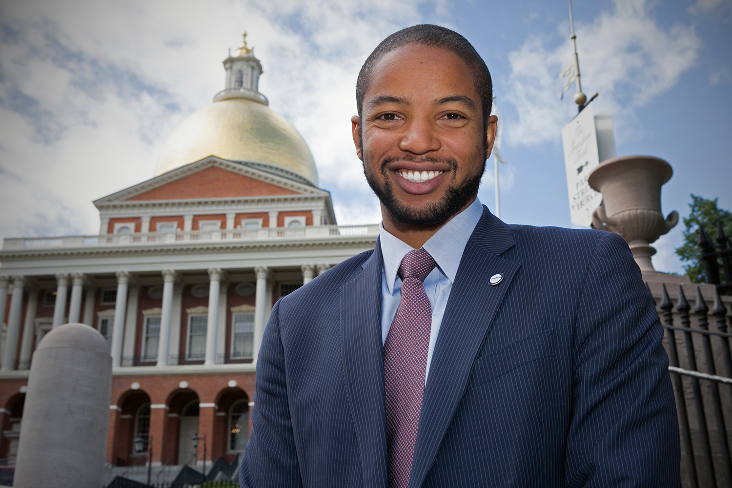 Austin Blackmon, chief of Environment, Energy and Open Space for the city of Boston, stands in front of the Massachusetts State House on June 9, 2016 in Boston. (Photo by Lauren Owens Lambert/GroundTruth)
