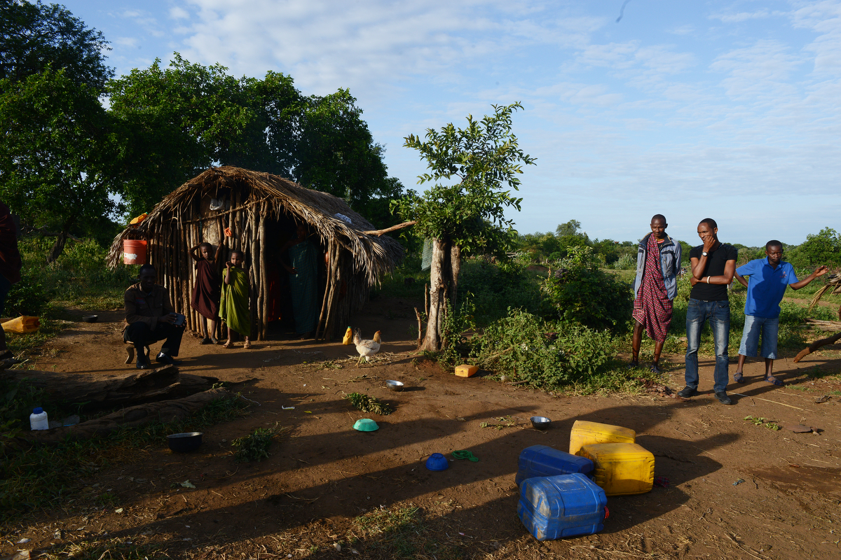 A Barabaig boma outside Mkombani sub-village. The Barabaig did not choose to be in the tiny sub-village but over time found themselves prodded into Mkombani, squeezed out by the competing interests of tourism, conservation and agricultural investors. (Photo by Dana Ullman/GroundTruth)