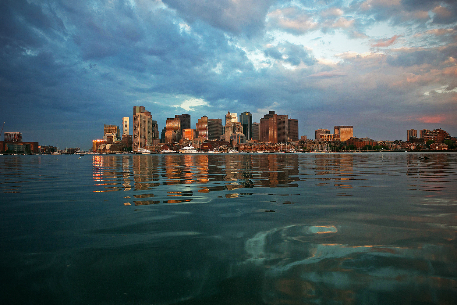 The view from East Boston as the sun rises over the Boston skyline on June 7, 2016. (Photo by Lauren Owens/GroundTruth)