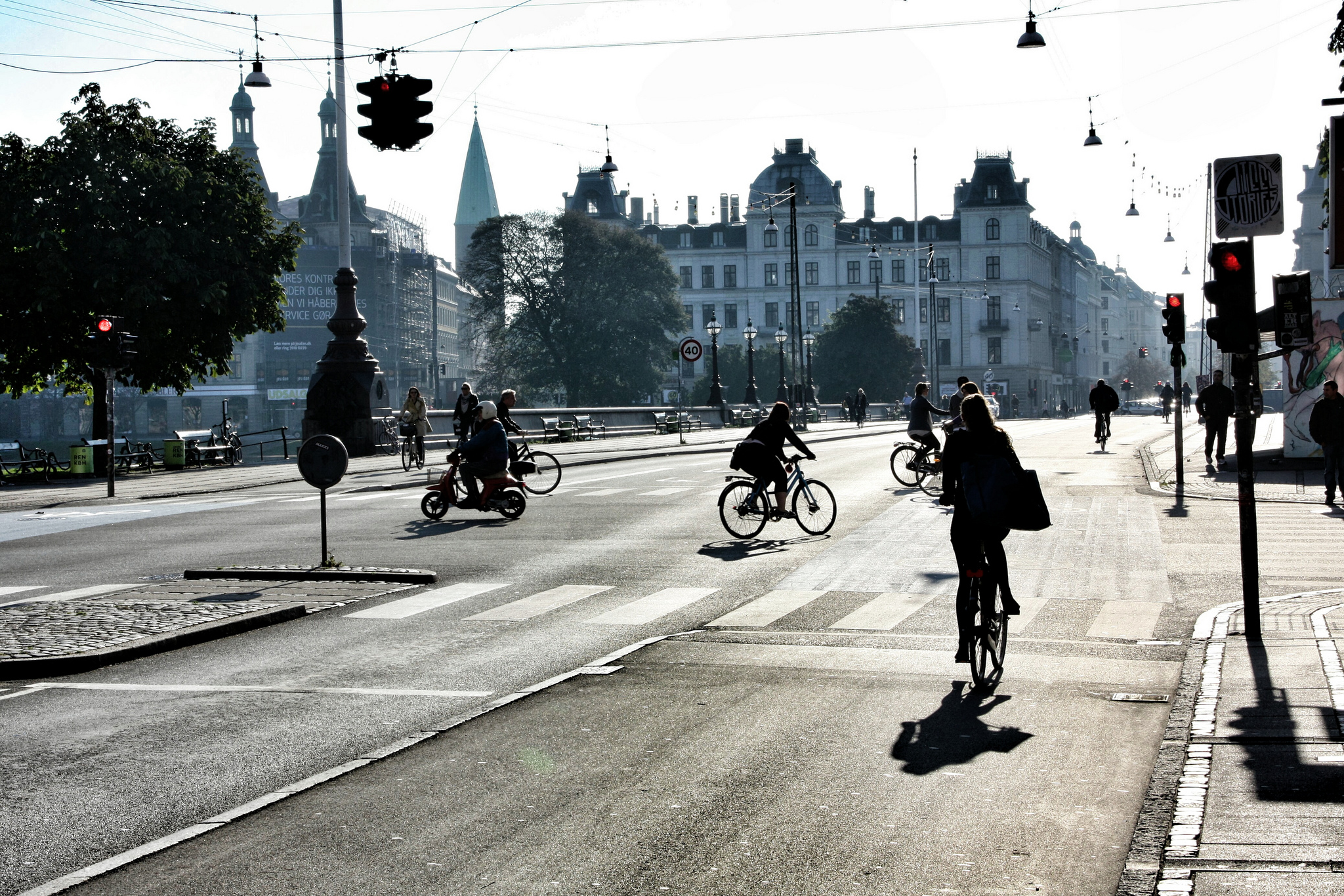 Cyclists commute to work on this otherwise-empty intersection in Copenhagen, Demark, where almost half of the city's commuters choose two wheels over a car. (Photo by Martin Fisch/Flickr User)