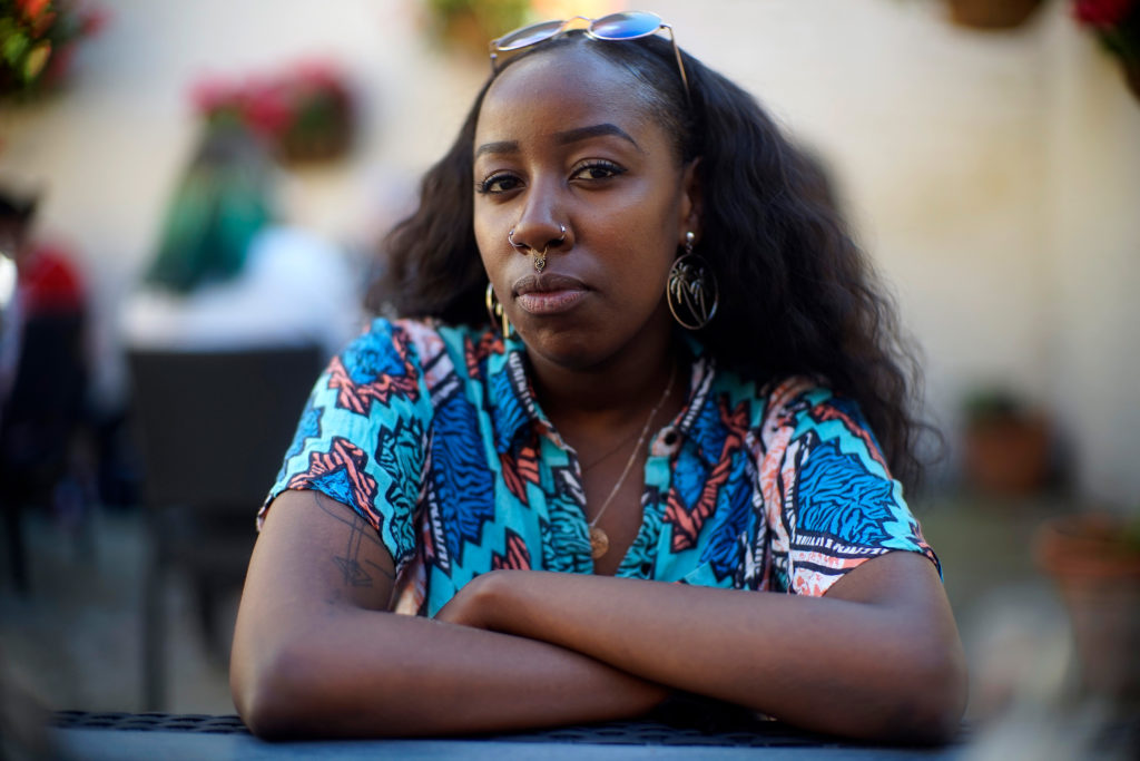 "I fear what will become of my generation," said Anita Israel, a 23-year-old student in London. Her family immigrated from Kenya to London when she was an infant, and the vote in favor of Brexit has left her feeling uncertain. (Photo by Jocelyn Bain Hogg/GroundTruth)
