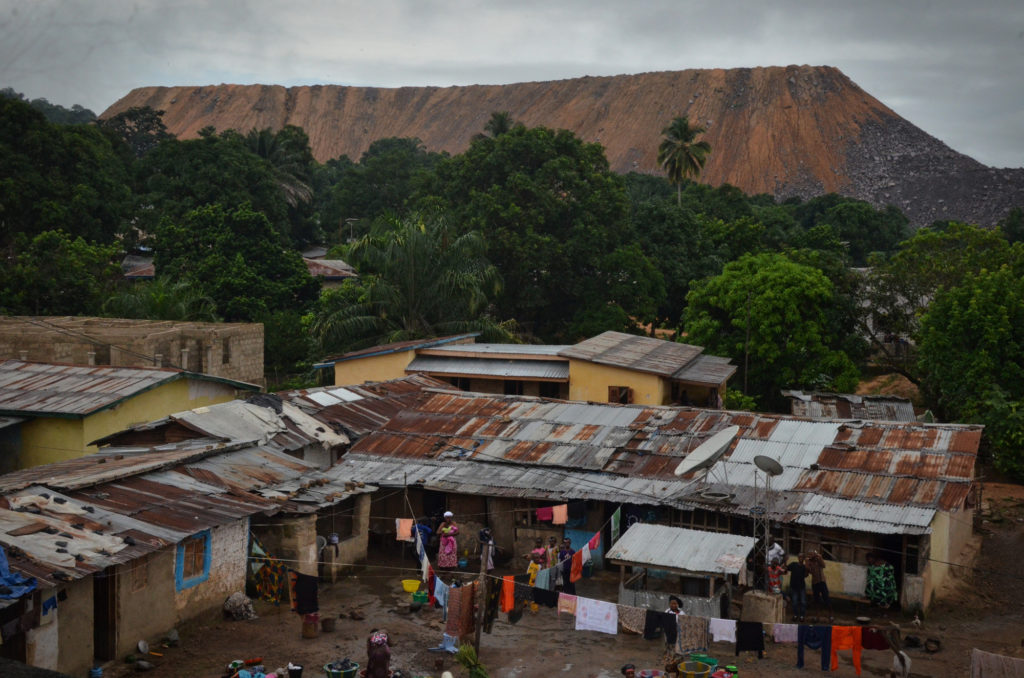 In eastern Sierra Leone, gravel caused by mine blasts can be seen surrounding Koidu, a city known largely as the capital of the diamond mining industry. (Photo by Cooper Inveen/ICIJ)
