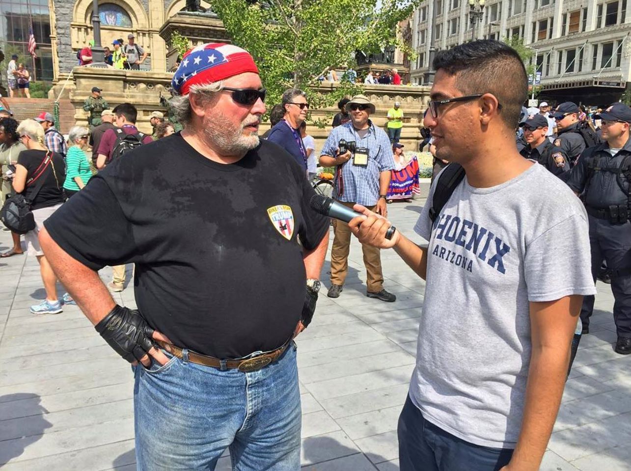 Mohamed Abdelfattah interviews Jack, a Trump supporter who rode from North Dakota to Cleveland for the RNC. (Photo by Jenny Montasir/GroundTruth)
