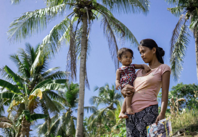 Tina was trafficked into a cyber sex den near Angeles when she was 16 and pregnant with her child. Her hometown, Daram, is one of the most vulnerable to climate change due to frequent storms and poverty. (Photo by Hannah Reyes/GroundTruth)