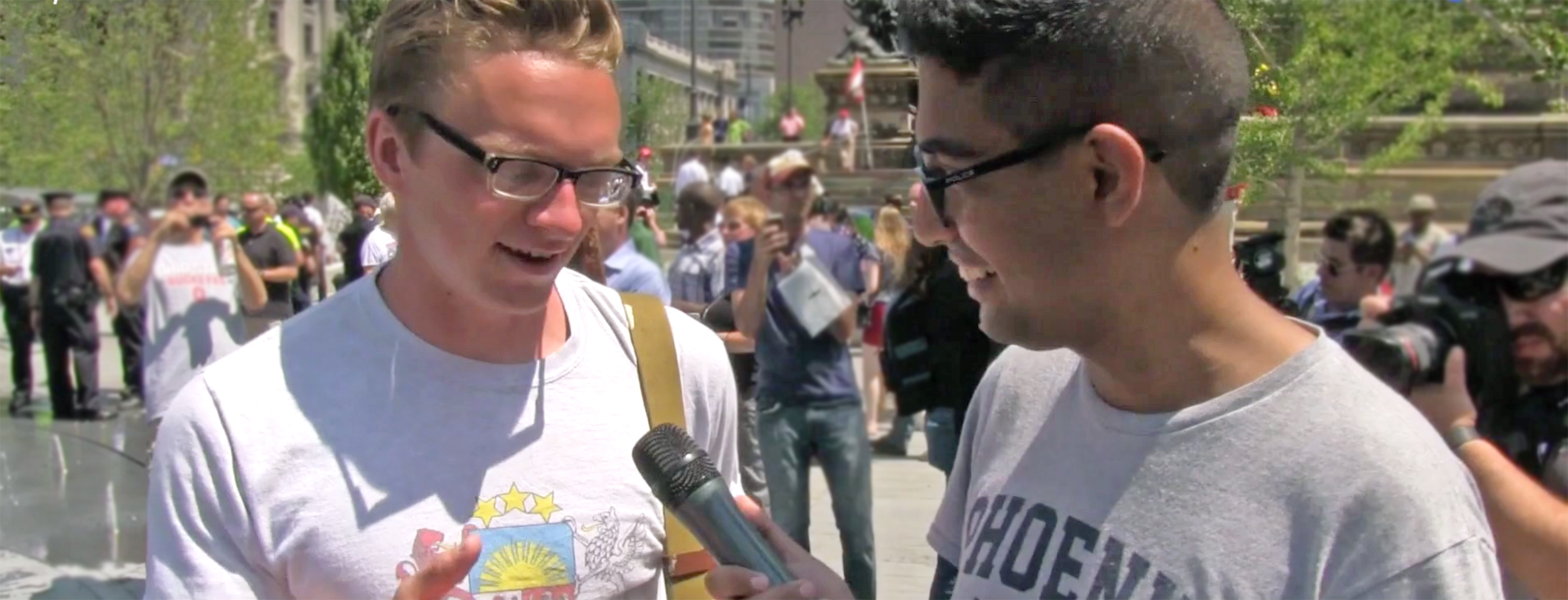 GroundTruth Fellow Mohammed Abdelfattah interviews an attendee of the Republican National Convention in Cleveland, Ohio. (Photo by Jenny Montasir/GroundTruth)