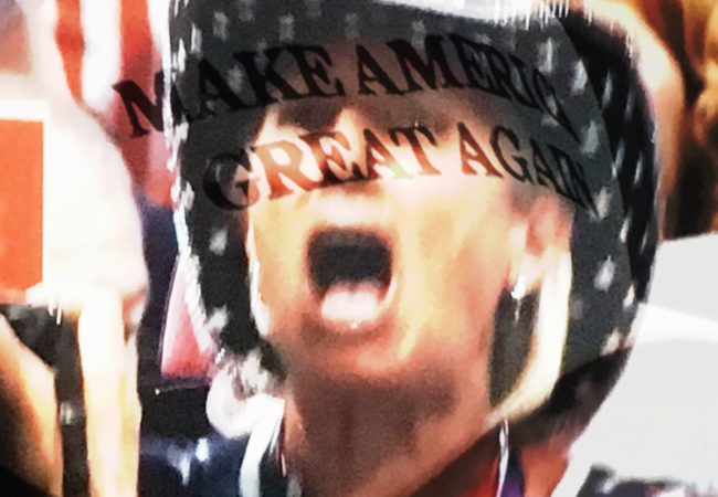 An attendee watches the speeches at the RNC. (Composite image by Biz Herman/GroundTruth)