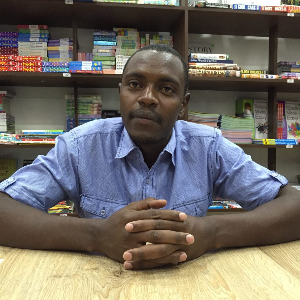 Samuel Mwangi hid with others inside of Savani's bookstore on the day of the Westgate shooting in 2013, a terrorist attack that killed 67 people. (Photo by Kevin Grant/GroundTruth)