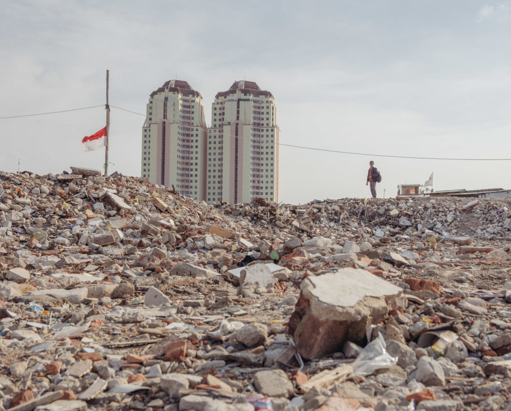 As part of Jakarta's river revitalization project, the Pasar Ikan neighborhood was recently razed, leaving its residents homeless. (Photo by Muhammad Fadli)