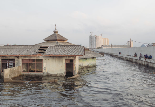 An abandoned mosque outside the sea wall in Muara Baru, North Jakarta. Jakarta is sinking as a result of massive groundwater extraction. And Muara Baru, one of the fastest sinking parts of the city, is already located below the sea level. (Photo by Muhammad Fadli)