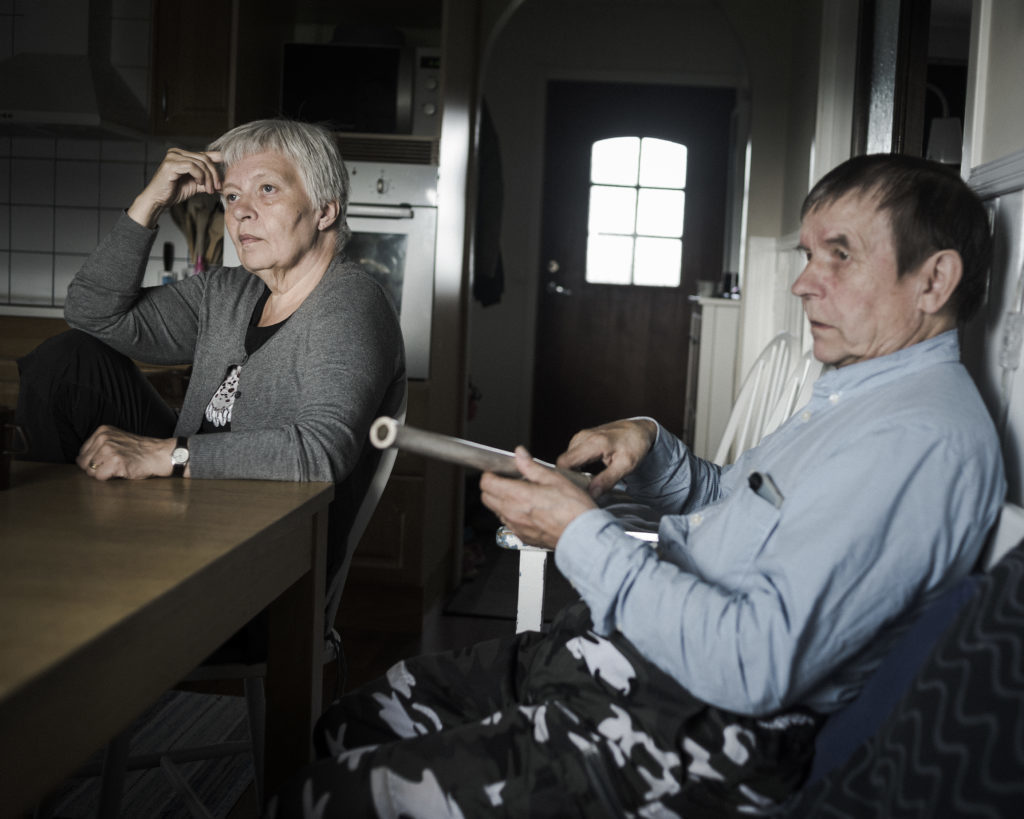 Randi and Thomas Marainen sit in their kitchen in Nedre Soppero, Sweden. 