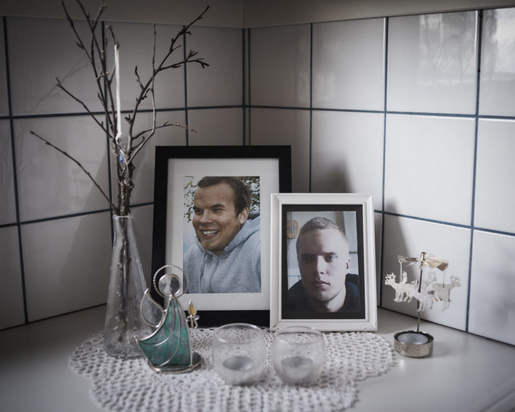 The corner in the kitchen is home to a memorial for Gustu and Heaika Marainen, who both took their own lives in 2014. (Photo by Camilla Andersen/GroundTruth)
