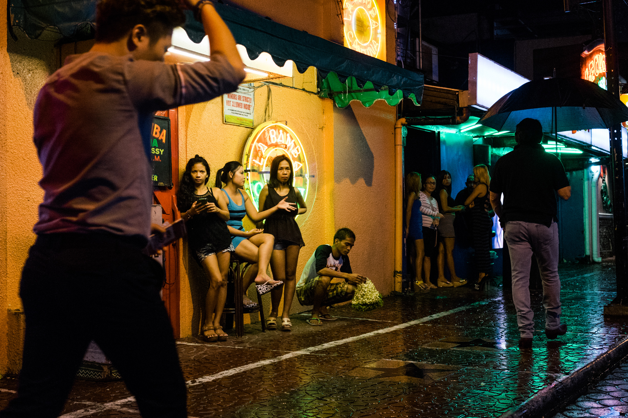 A scene from Fields Avenue, the red light district in Angeles City, notorious for its sex tourism. (Photo by Hannah Reyes Morales/GroundTruth)