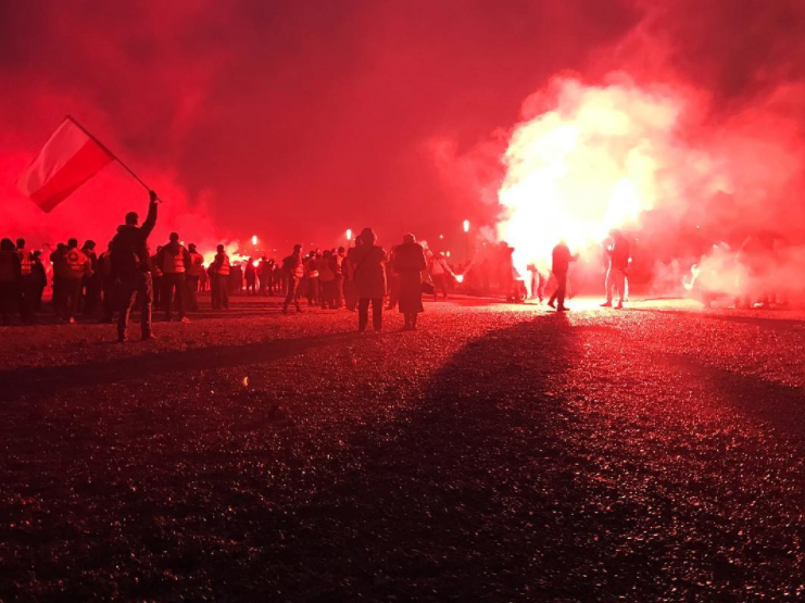 Young people participate in a nationalist demonstration on the country's Independence Day in Warsaw, Poland. (Photo by Karolina Chorvath/GroundTruth)