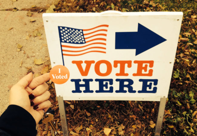Vote here sign
