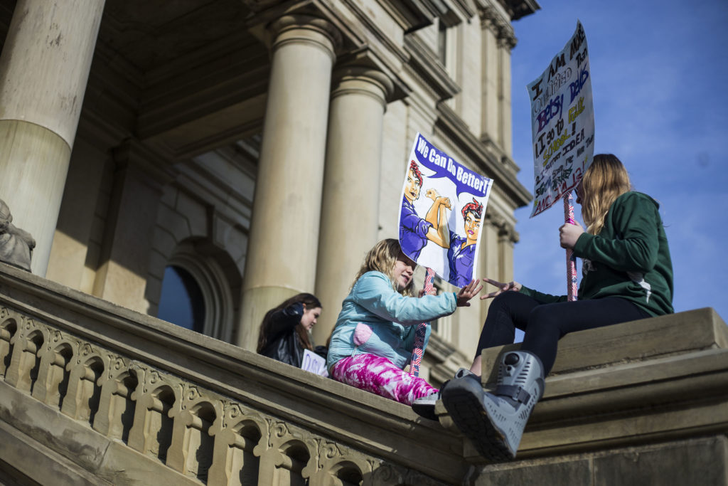 Thousands gather outside of the Michigan State Capitol Building for the Women's March on Lansing in Lansing, Mich., on Saturday, January 21, 2017. (Photo by Brittany Greeson/GroundTruth)