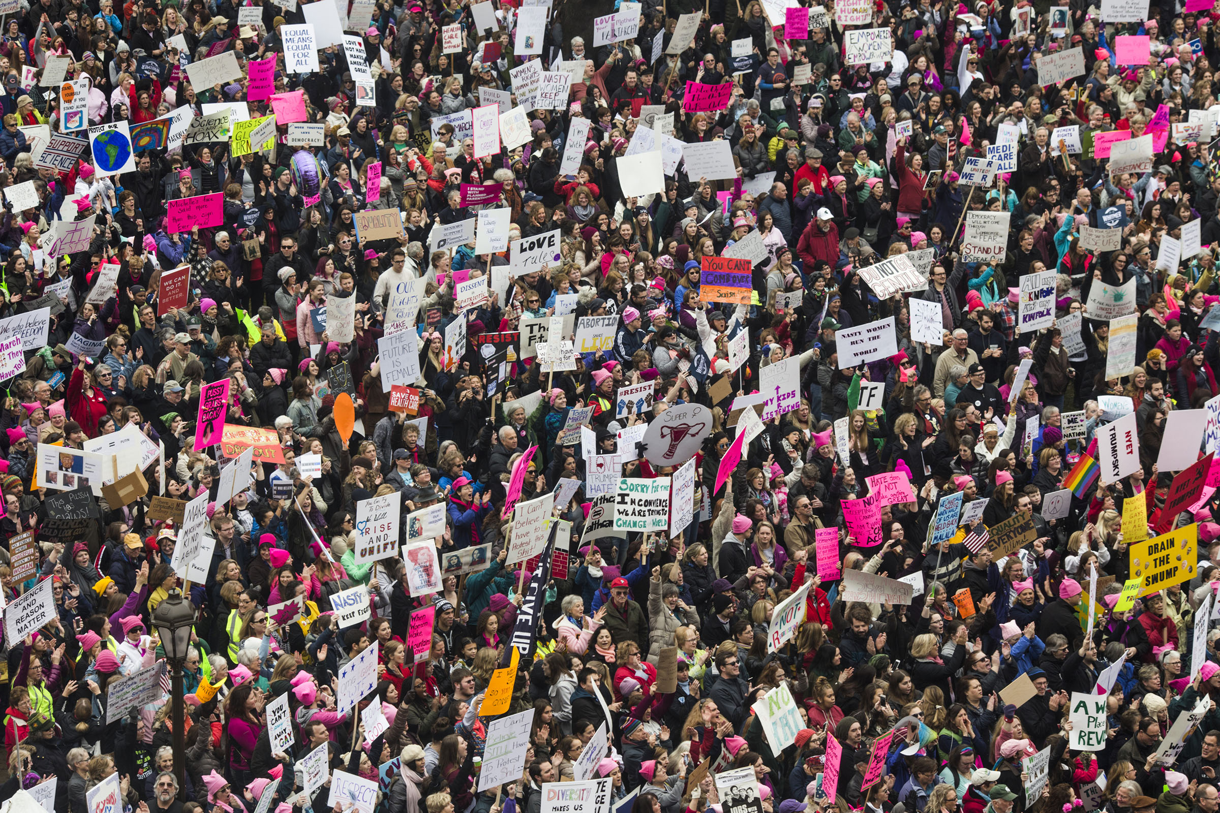 Thousands gather outside of the Michigan State Capitol Building for the Women's March on Lansing in Lansing, Mich., on Saturday, January 21, 2017. (Photo by Brittany Greeson/GroundTruth)
