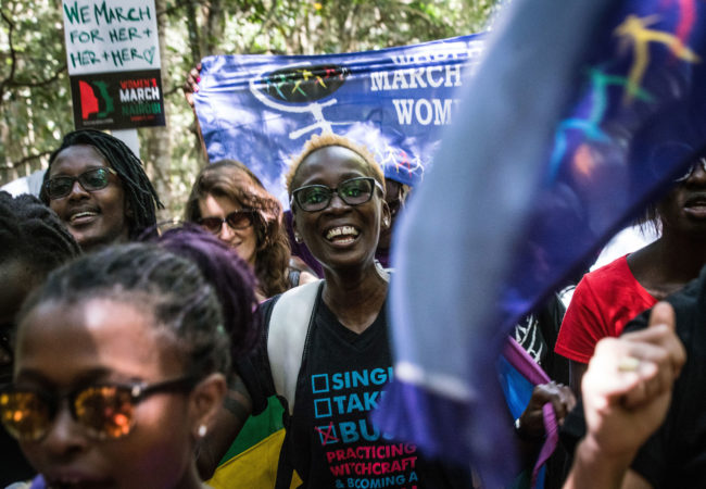 People participate in a “sister march” in the Kenyan capital of Nairobi on January 21, 2017. (Photo by Nichole Sobecki/GroundTruth)
