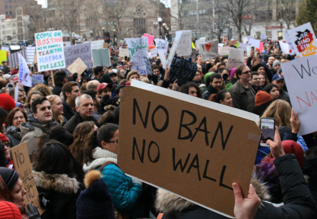 The debate on immigration has become extremely polarized. How do you write stories that say something new? Find people who've never been asked about their experiences. Pictured: protesters in Boston's Copley Square on Jan. 29, 2017, after President Donald Trump signed an executive order known as the "Muslim ban." (Photo by Giulia Afiune/GroundTruth)