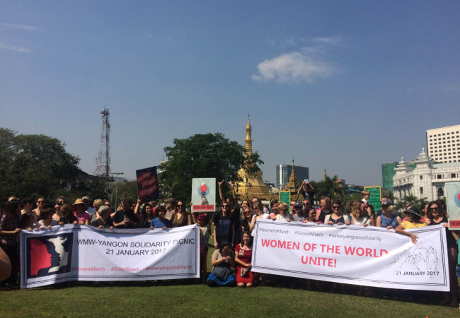 About 70 people gathered in downtown Yangon, Myanmar to show support for the Women's March on Washington and sister marches around the world. (Photo by Nan Tin Htwe/GroundTruth)