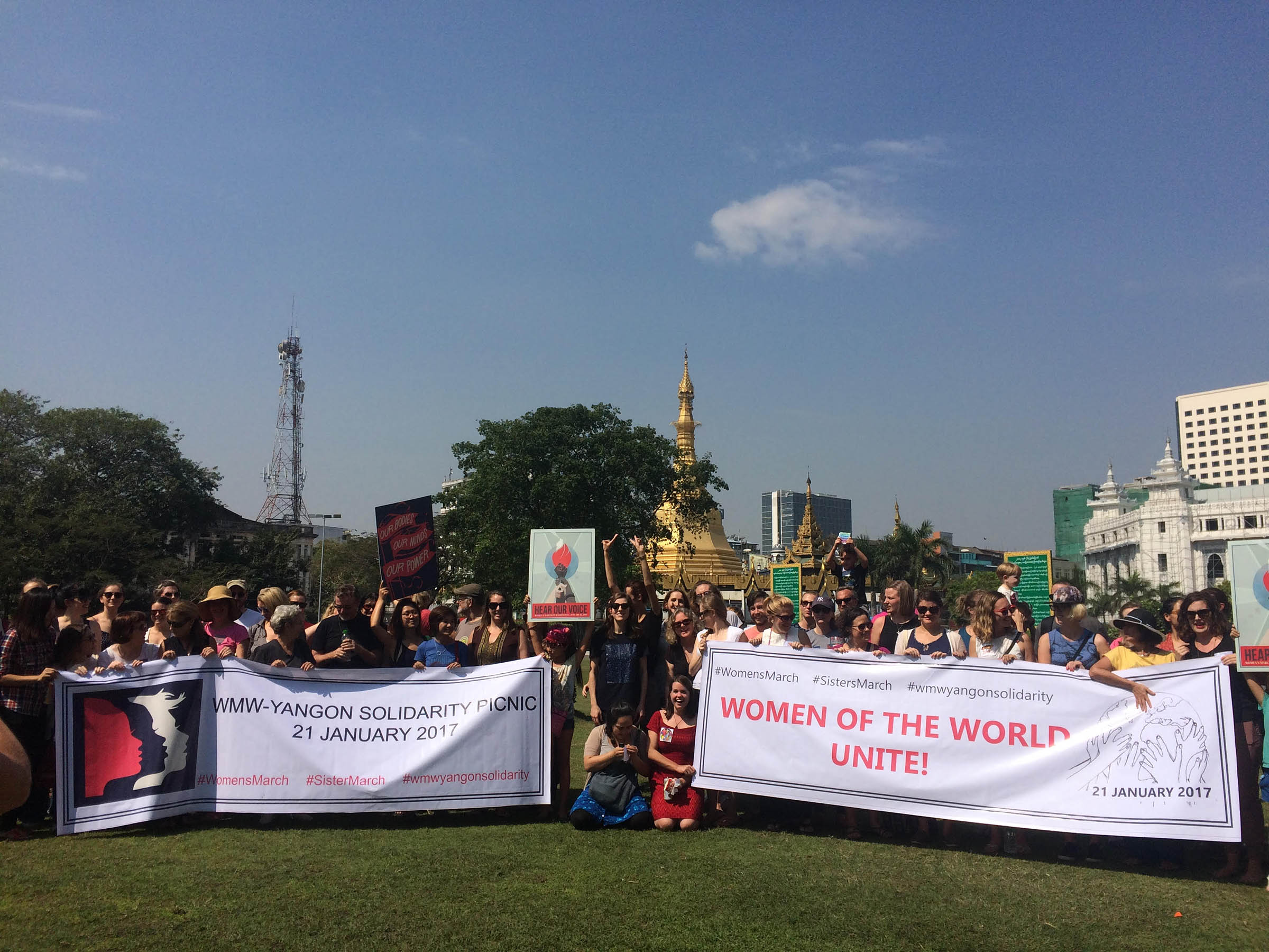 About 70 people gathered in downtown Yangon, Myanmar to show support for the Women's March on Washington and sister marches around the world. (Photo by Nan Tin Htwe/GroundTruth)