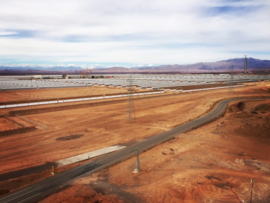 The Moroccan city of Ouarzazate built concentrated solar power panels across its desert. Morocco aims to get more than half of its energy from renewable sources in less than 15 years. (Photo by Chris Bentley/GroundTruth)