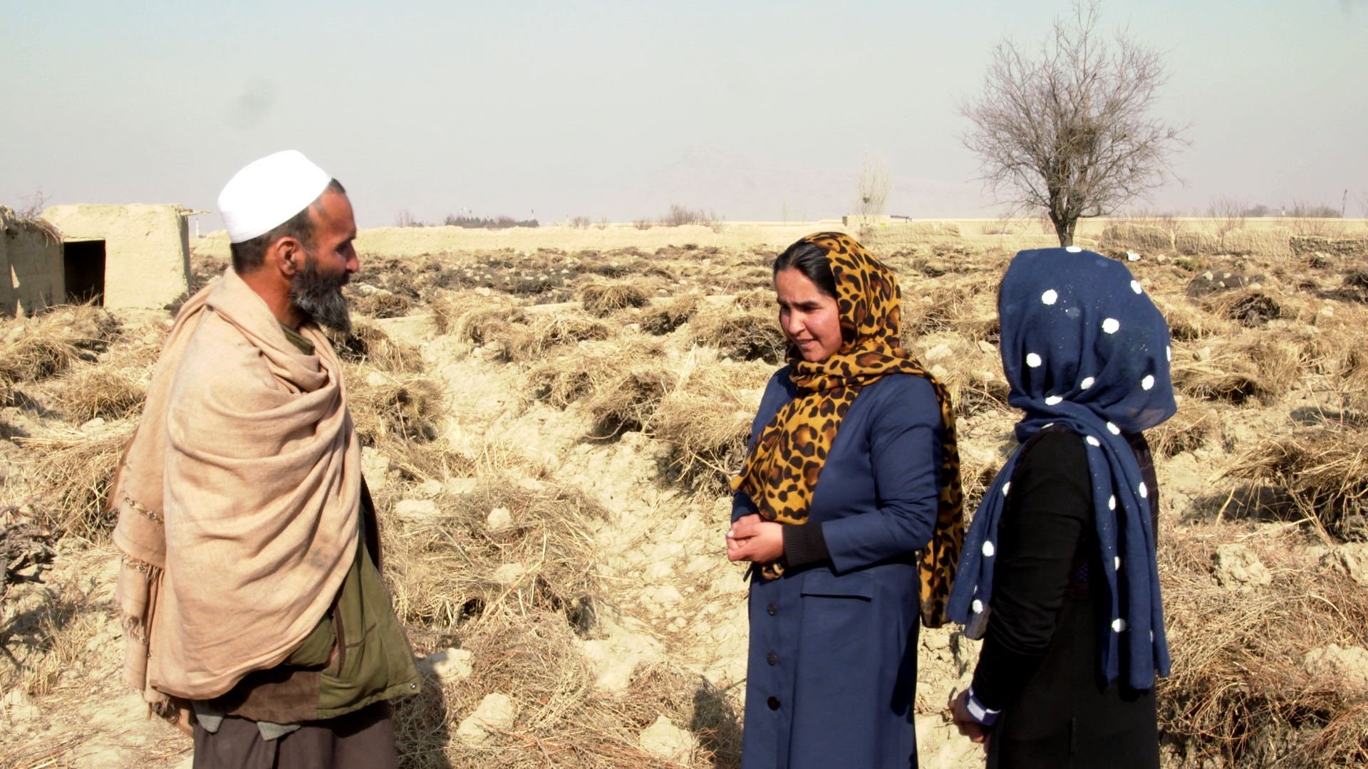 Hafizallah and his two daughters, Maryam, 23, and Goldasta, 24, live in Afghanistan's Hindu Kush mountain valley. (Photo via GroundTruth Films)