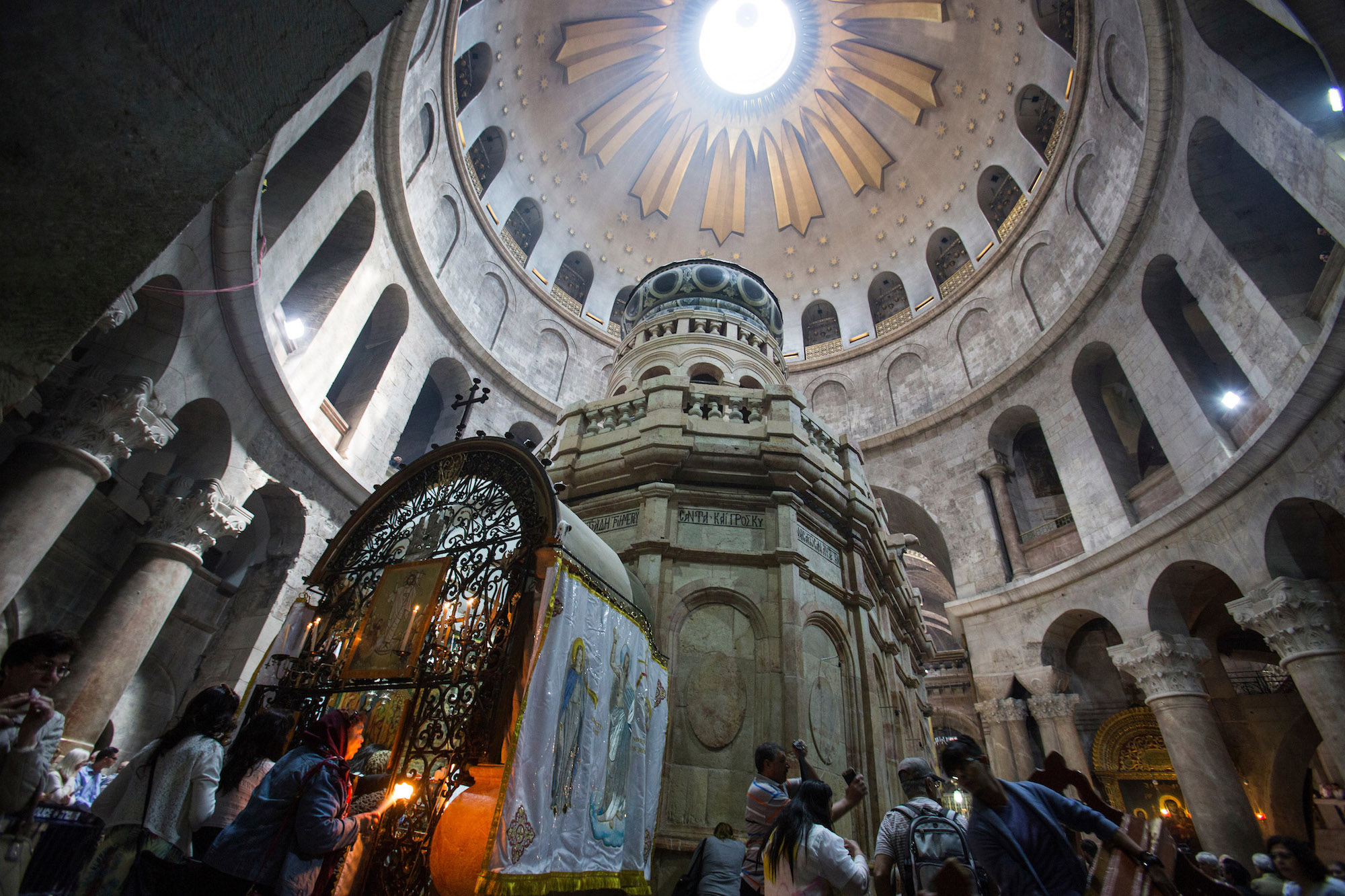 Christian pilgrims during the Easter Sunday procession at the Church of the Holy Sepulchre, which is believed to be the site of the crucifixion and burial of Jesus Christ. Thousands of Christians from around the world flocked to Jerusalem to commemorate the day when, according to Christian tradition, Jesus resurrected. Jerusalem, April 16, 2017 (Photo by Heidi Levine/GroundTruth).