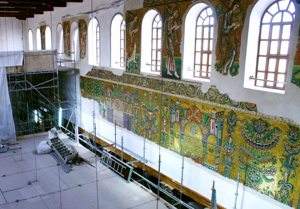The intricate mosaics on the walls of the Church of Nativity have been recently cleaned and restored. The mosaics are made of gold and silver leaf, with mother of pearl and other stones, too. (Photo by Cate Malek/GroundTruth)
