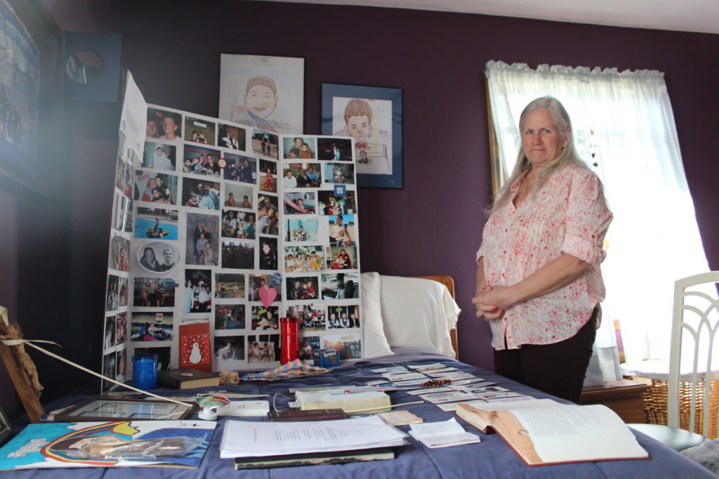 Candace Crupi stands in the room of her son, Johnny Crupi, who died of a heroin overdose at the age of 21. (Photo by Noah Caldwell/GroundTruth)