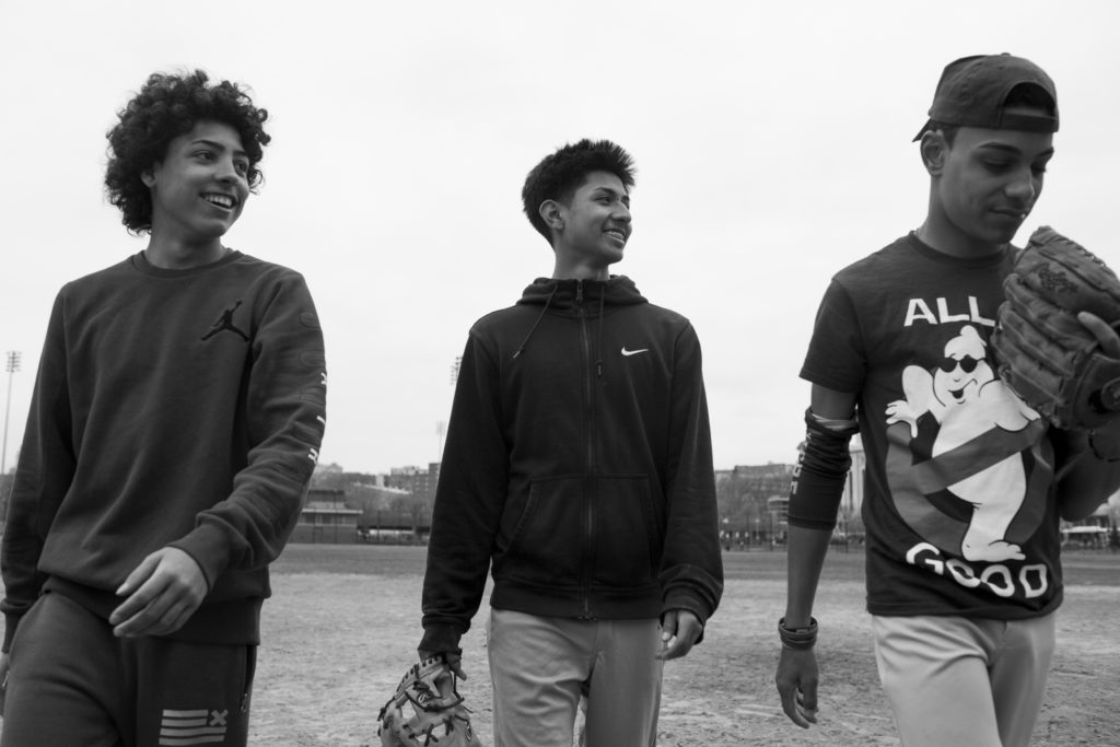 Edwin, Chavi, and Steven practice baseball in front of Yankee Stadium, March 26, 2017, Bronx, New York. The friends meet once a week to practice at the fields together. (Photo by Sarah Blesener/GroundTruth/Alexia Foundation)