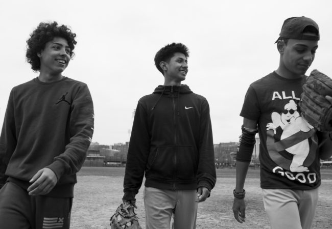 Edwin, Chavi, and Steven practice baseball in front of Yankee Stadium, March 26, 2017, Bronx, New York. The friends meet once a week to practice at the fields together. (Photo by Sarah Blesener/GroundTruth/Alexia Foundation)
