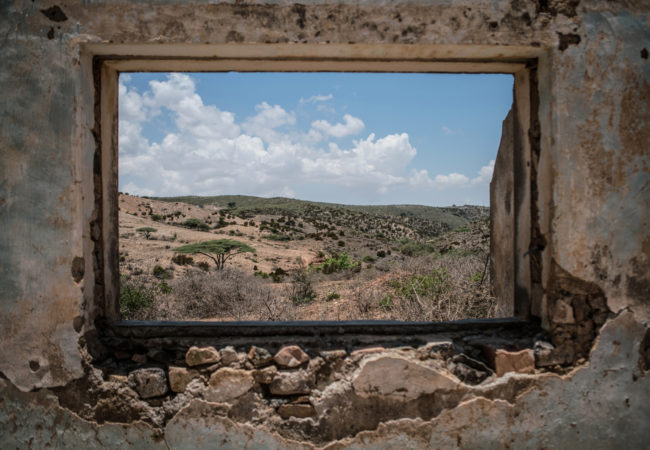 Somalia’s arid landscape as seen from inside a decaying colonial building in the Somaliland town of Sheikh. (Photo by Nichole Sobecki/GroundTruth)