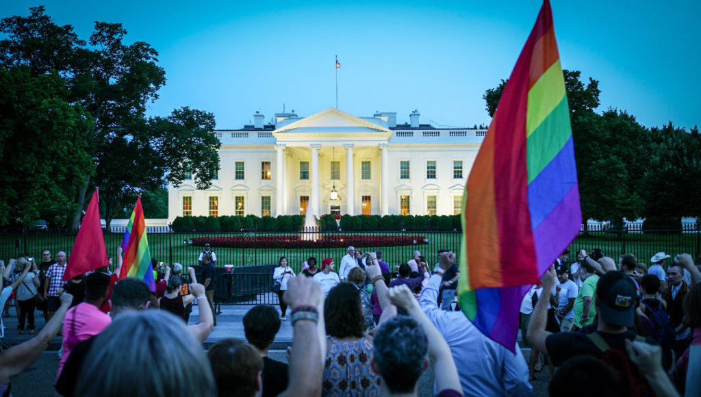 Protesters at the White House on July 26, 2017, protest Donald Trump's announcement on Twitter, that transgender military servicemembers will no longer be allowed to serve. (Ted Eytan/Flickr Creative Commons)