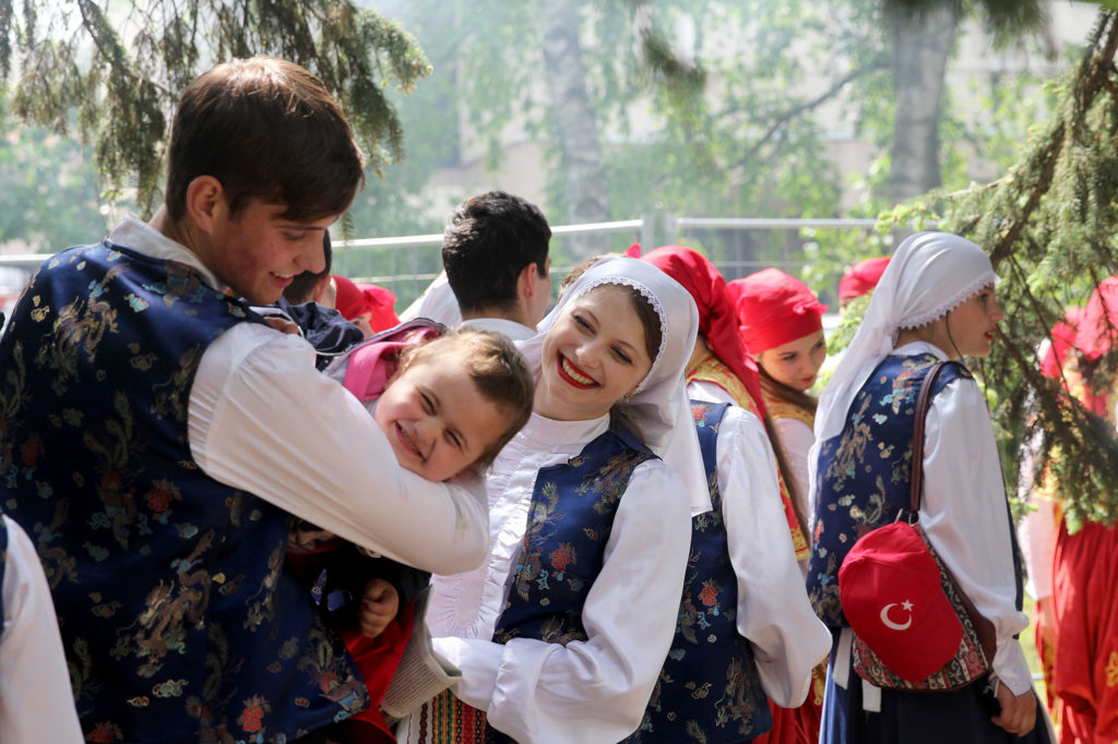 Dancers in national costumes wait in the wings to perform for E.U. Day. Moldovans find their country in a tug of war between Russia and the E.U. (Carolyn Cakir/Medill/GroundTruth)