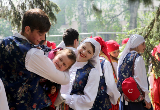 Dancers in national costumes wait in the wings to perform for E.U. Day. Moldovans find their country in a tug of war between Russia and the E.U. (Carolyn Cakir/Medill/GroundTruth)
