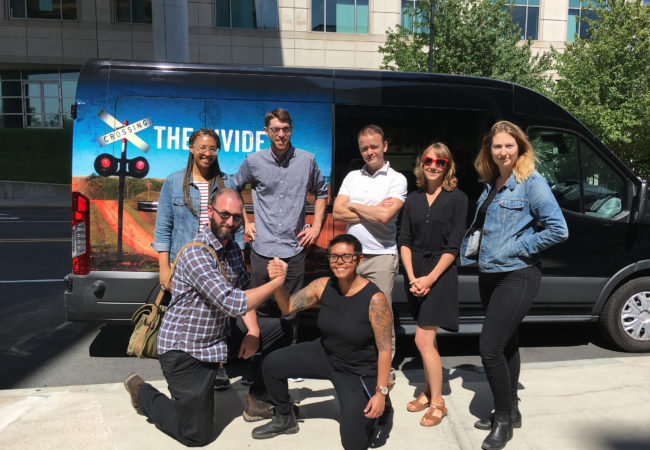 Back row: Mahlia Posey, Eric Bosco, Gabriel Sanchez, Rachel Cramer and Brittany Greeson are the reporting fellows for Crossing the Divide. In front: Ben Brody and Qainat Khan are the field producers for the project. (Photo by Rachel Rohr/GroundTruth)