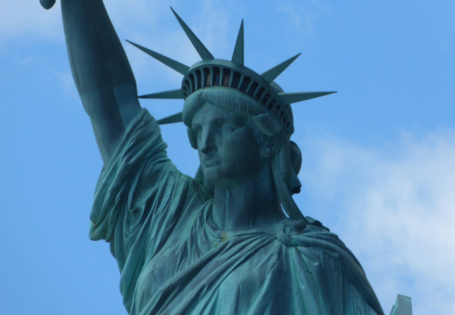 The Trump administration's proposed RAISE Act, to limit immigration, defies the spirit of the Emma Lazarus poem inscribed on the Statue of Liberty, writes Kevin Grant. (Alex.m.Hayward/Flickr)