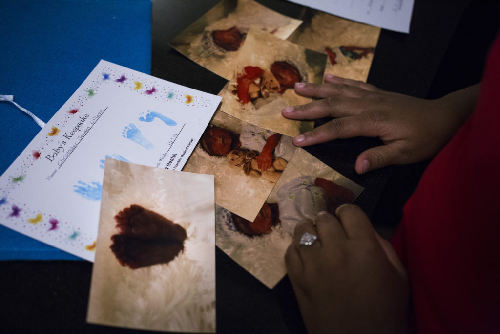 Tre'ana Taylor, 17, shows the photos she has of her son C.J., at the hospital where he died prematurely, at her home in Springfield, Mass., on Monday, September, 11, 2017. (Photo by Brittany Greeson)