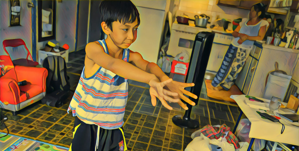 Maddox practices his Cambodian dance moves in front of the TV. His grandmother Ly Chea prepares lunch — a spicy Cambodian stew. (Photo by Heidi Shin with Prisma filter)