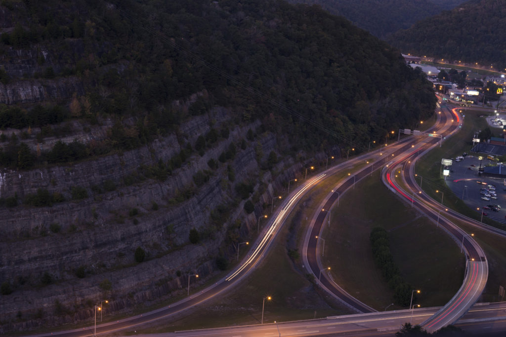 Layers of rock are seen towering above a busy highway just outside of Pikeville, Ky., on Saturday, September 29, 2017. (Photo by Brittany Greeson)