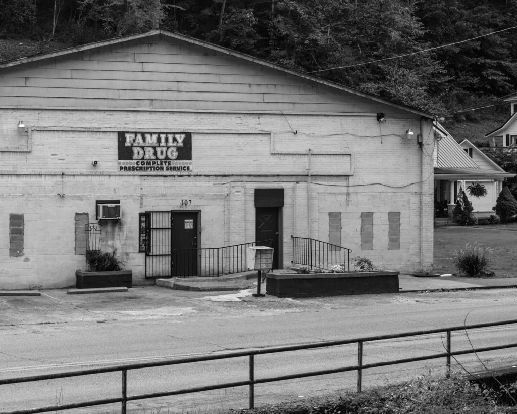 A pharmacy is one of the few remaining businesses in the former coal camp of Wheelwright, Ky. (Photo by Ben Brody)