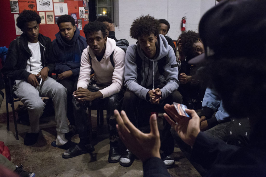 A group of young people, most from the Cedar-Riverside neighborhood of Minneapolis, come together for what was hopefully the first meeting of a weekly effort to make the youth in the Somali and wider immigrant community politically conscious and aware of how governing systems work in Minneapolis, Minn., on Monday, October 9, 2017. (Photo by Brittany Greeson)