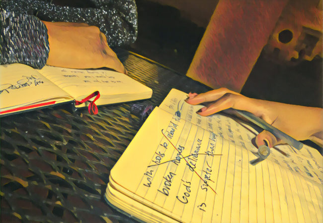 Amal Hussein and Hamdi Mohamed work on poems together (Photo by Ian Coss with Prisma filter)