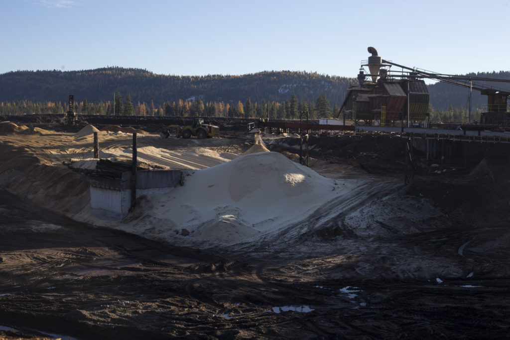 A mountain of sawdust collects from a chute at Pyramid Mountain Lumber Inc., in Seeley Lake, Montana, on Thursday, October 29, 2017.