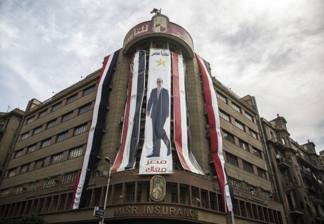 A Sisi banner hangs in Cairo. After a democratic election in 2012 that put the Muslim Brotherhood in power, Sisi led a coup that overthrew the democratically-elected president, and banned the Muslim Brotherhood and pro-democracy demonstrators. (Roger Anis/GroundTruth)