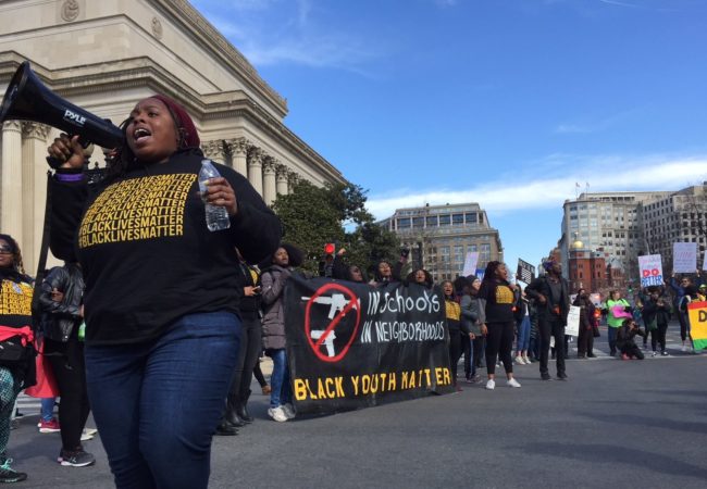 Supporters of Black Lives Matter join an estimated 500,000 marchers at the March For Our Lives rally in Washington, D.C. on March 24, 2018. (Photo by Kevin Grant)